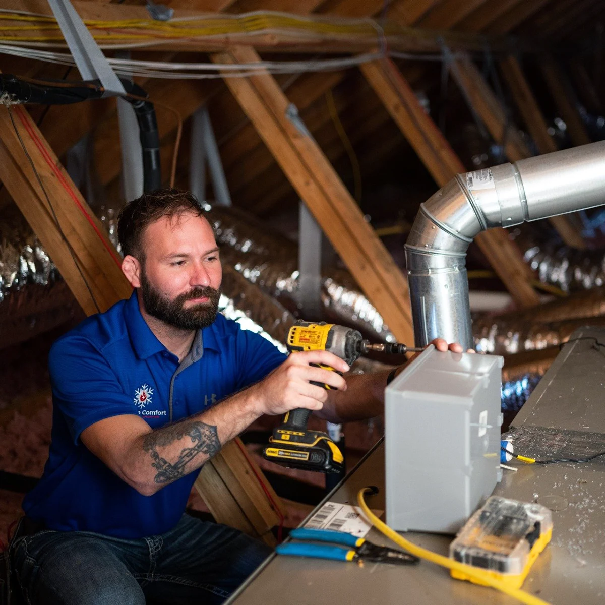 Technician repairing residential heating system